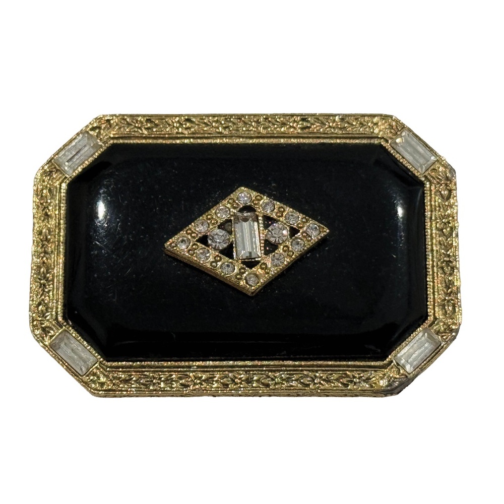 1928 Co Black Cabochon Gold Tone Floral Edge Brooch